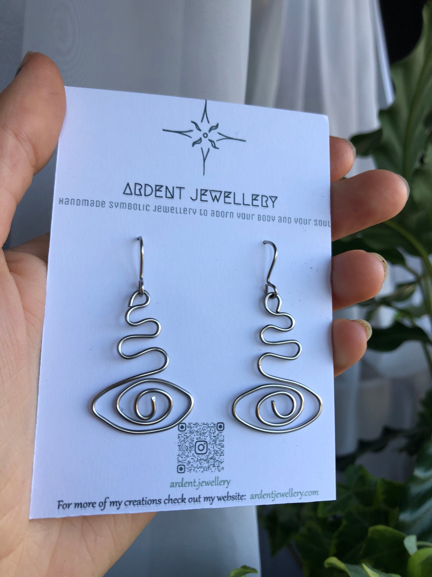 Eye Spiral Earrings